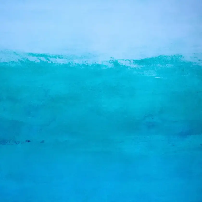 Surface d'eau dans des tons de bleu et turquoise, avec des nuances douces et un dégradé subtil.